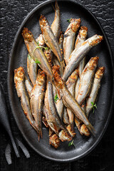 Tasty and salty smoked sprats as popular mediterranean food.