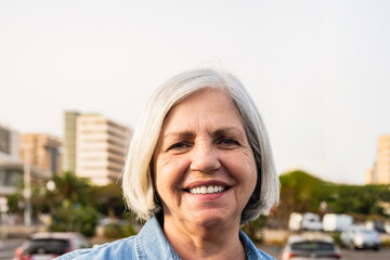 Happy senior woman smiling in front of camera - Elderly people lifestyle concept - 766312436