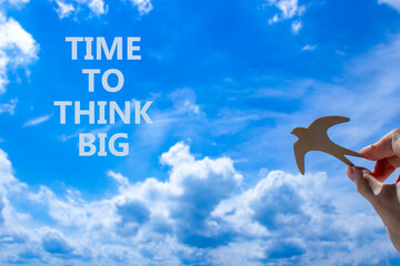 Time to think big symbol. Concept words Time to think big. Beautiful blue sky cloud background....