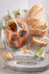 Delicious and fresh pickled herring with onion and tomatoes.