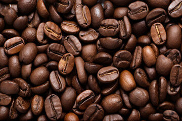 Fototapeta premium Processed collage of dark brown coffee beans texture. Background for banner, backdrop or texture
