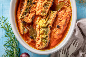 Delicious roasted mackerel in vinegar with spices and onion. - 766314885