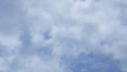 Ornamental clouds. Dramatic sky. Epic cloudscape. Soft sunlight. Panoramic image, texture, background, graphic resources, design, copy space. Meteorology, heaven, hope, peace concept