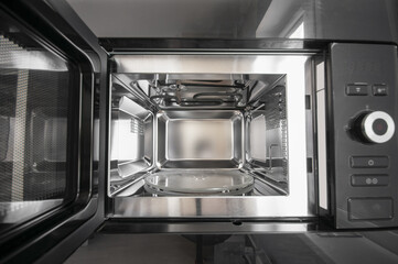 Inside view of new, empty microwave close up