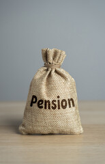 Bag with the word Pension. Ensure financial security during a persons golden years. Employee...
