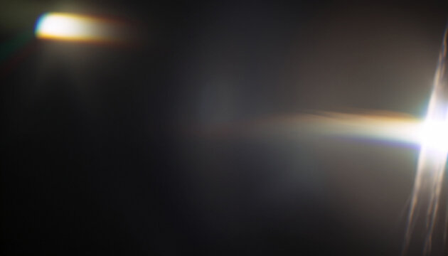 Real Lens flare light effect. Sparkle ray leak on black background. Optical effect of spotlight. Flash leak beam.