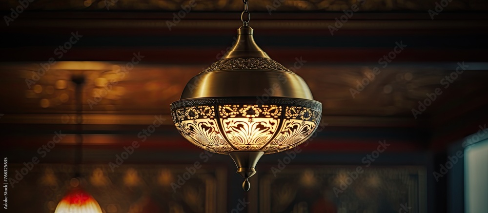 Poster a single light fixture suspended from the ceiling illuminating the room below, casting soft light in