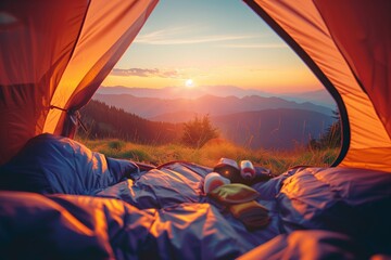 Cozy tent door open towards a stunning mountain view at sunset
