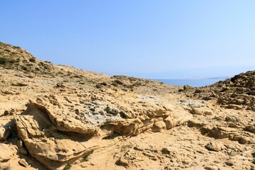 Fototapeta na wymiar Sandstone formation on the coast of Lopar on the island Rab, Croatia