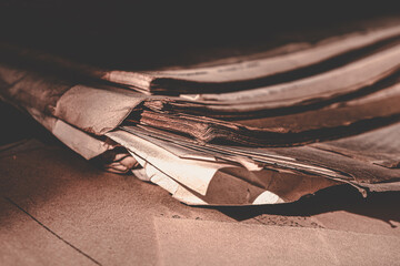 a pile of old paper with a yellowing color, old paper over time, old or worn sheets of paper, old...