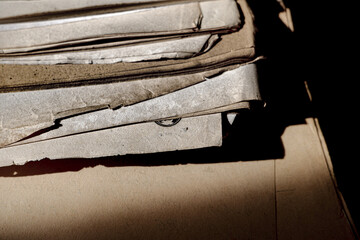 a pile of old paper with a yellowing color, old paper over time, old or worn sheets of paper, old...