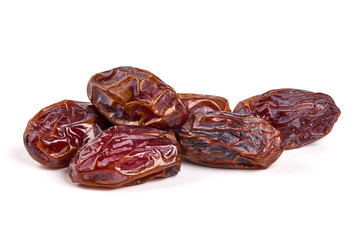 Raw Organic Medjool Dates, isolated on white background.