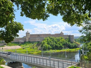 Fototapeta na wymiar View of Ivangorod Castle in Russia separated from Europe by the border of the Narva River