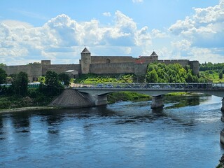 View of Ivangorod Castle in Russia separated from Europe by the border of the Narva River - 766363858