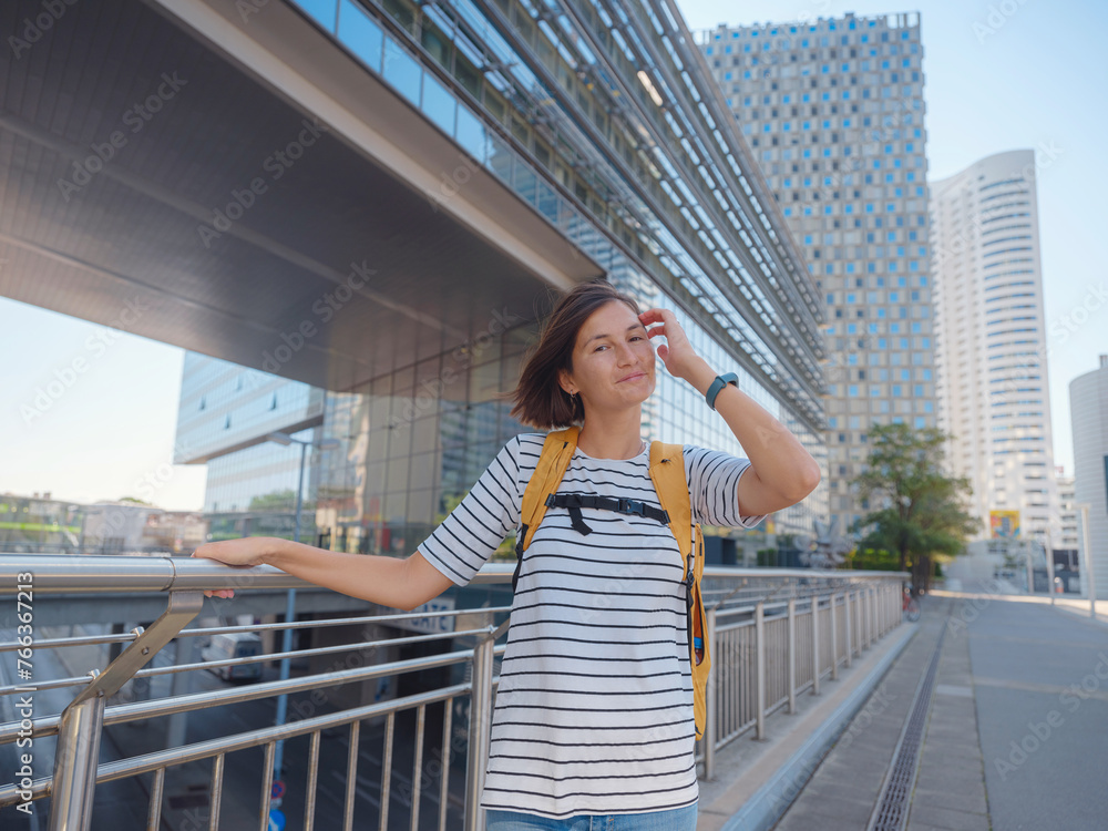 Wall mural female tourist traveling in austria, capital city vienna. summer female solo trip to europe, happy y