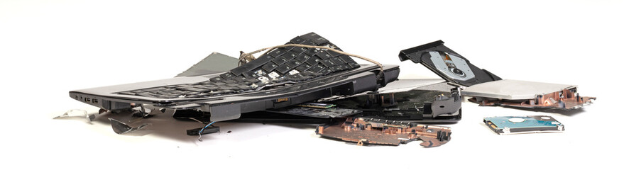 Old broken laptop isolated on white background