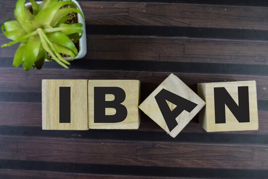 Concept of The wooden Cubes with the word IBAN on wooden background.