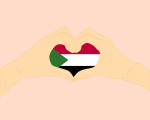 Sudan flag with two hands heart shape, express love or affection concept