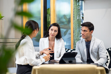 Real Estate agent, life insurance agent - Asian woman insurance agent offer insurance plan to...