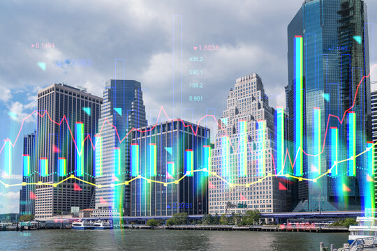 Manhattan skyline with a holographic overlay of financial graphs, on a cloudy day background. Double exposure