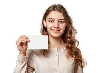 Fototapeta premium A young woman holding a blank business card Isolated on white background