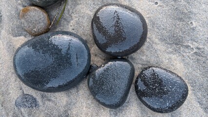 The Melted Rocks of Swamis Beach. Erosion control boulders put down along the shore 50 years ago...