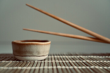chopsticks and bowl of soy sauce