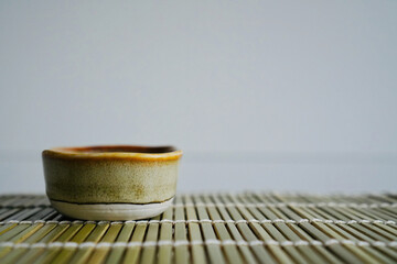 chopsticks and bowl of soy sauce