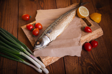 Hot smoked mackerel on the table in the kitchen.