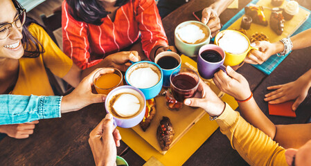 Group of people having fresh healthy breakfast sitting at bar table - Happy friends drinking...