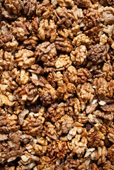 Obraz premium Lots of shelled walnuts. The concept of healthy eating and organic food. Vitamin food. Top view