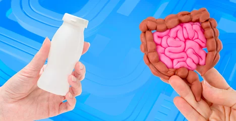 Poster Probiotics for digestion. Bottle yogurt in man hand. Intestinal tract. Probiotic medicine. Fermented milk products with lactobacilli. Healthy yogurt for digestion. Probiotic product for health © Grispb
