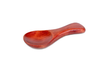 Small red wooden spoon for spice isolated on white background