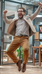 A joyful company employee is dancing around the office to celebrate a deal or other business...