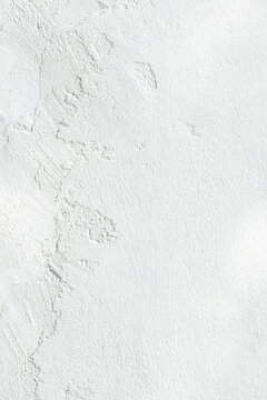 Vertical Blank concrete white rough wall for background. Beautiful white wall surface background pattern..