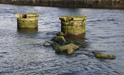 Old Stone Bridge Piers in a River Estuary - 766441813