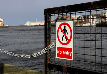 No Entry Warning Sign at an Urban River Estuary Location - 766441818