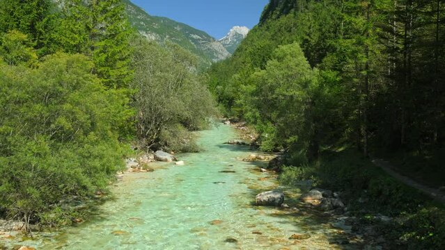 Emerald alpine water of Soca mountain river in Slovenia, Triglav National Park