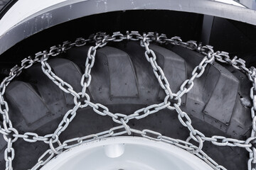 winter tire chain on the industrial tire - 766448297