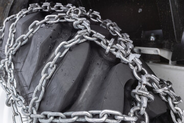 winter tire chain on the industrial tire - 766449426