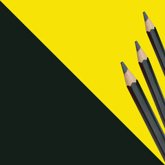 Black pencils on a yellow paper art board and have copy space. - 766451293