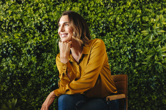 Thoughtful woman embracing sustainable entrepreneurship and business practices