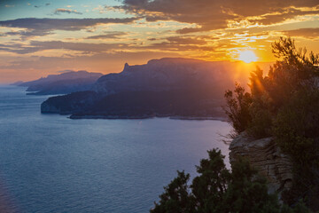 Fototapeta na wymiar Beautiful landscape with sea and rocks, sunset on the Mediterranean sea.