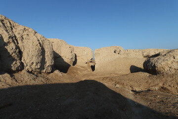 Ancient city of kish , 3100 bc , al-ahmar hill in Babylon in Iraq , ancient ruins with blue sky	