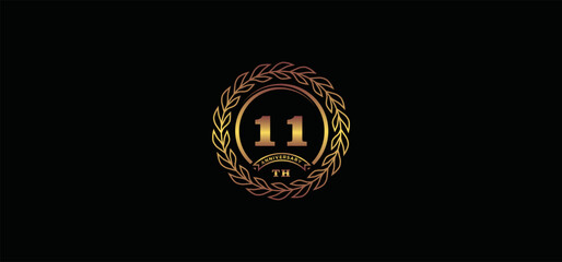 11st anniversary logo with ring and frame, gold color and black background