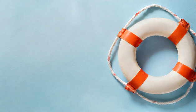 summer banner with lifesaver on a light blue light background. Top view, flat lay with a big copy space.