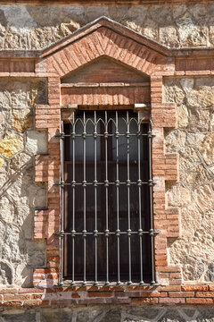 old Street windows by the streets of Barcelona with metal bars