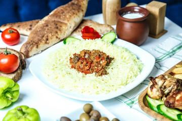 White Plate With Meat and Vegetables