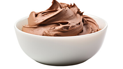 A white bowl overflows with rich chocolate frosting on a pristine white table