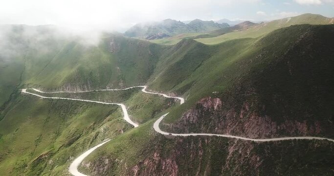 Beautiful mountain road in green landscape in northwest Argentina
